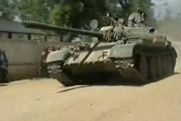 A picture containing military vehicle, transport

Description automatically generated