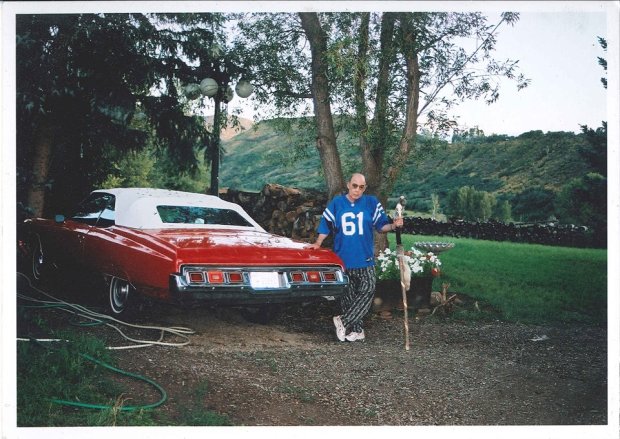Hunter S. Thompson poses by his car in this undated photo taken at Owl Farm in Woody Creek, just outside Aspen in the Roaring Fork Valley.