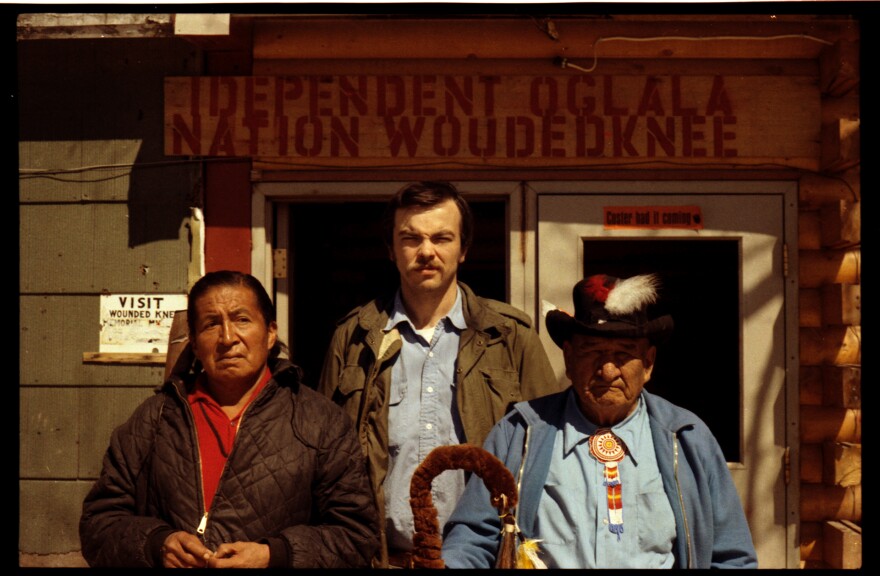 A group of men posing for a photo

Description automatically generated with medium confidence