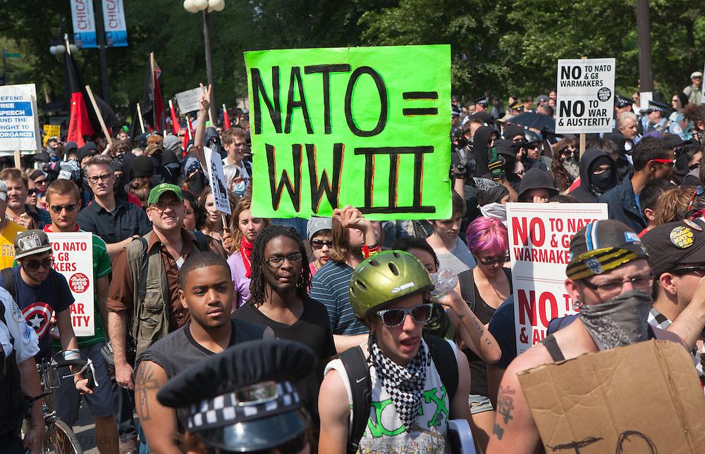 A group of people holding signs

Description automatically generated with medium confidence