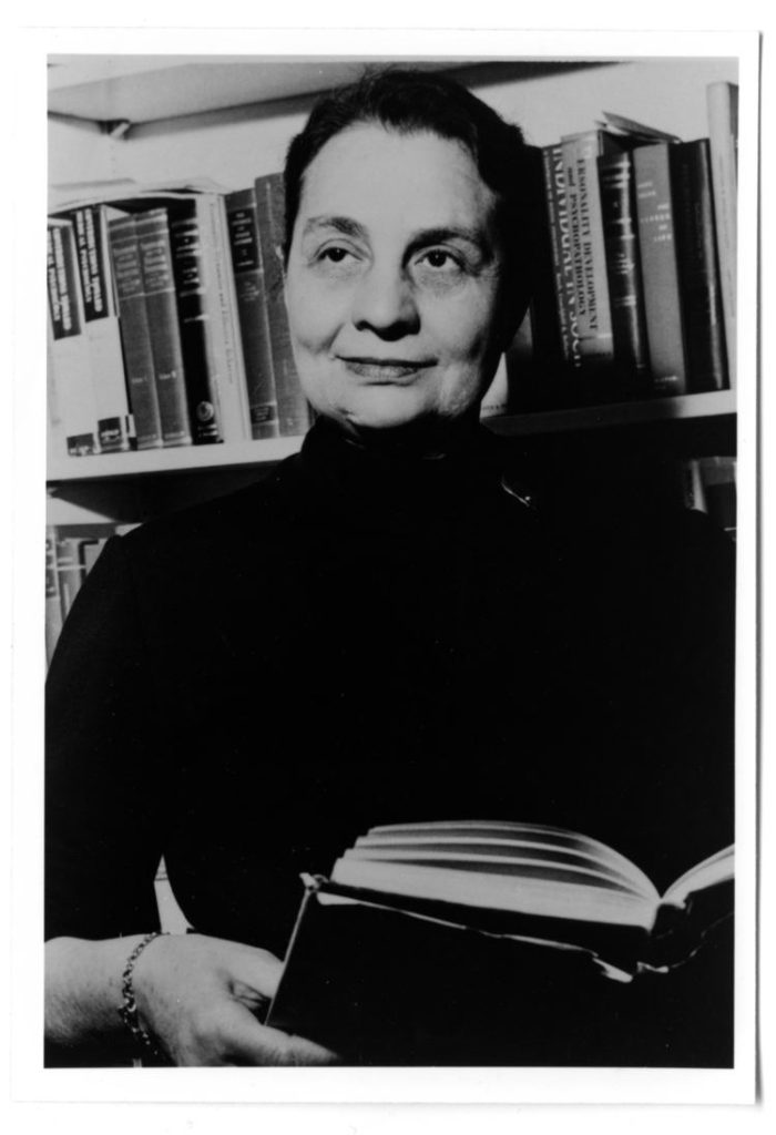 A person holding a book

Description automatically generated with low confidence