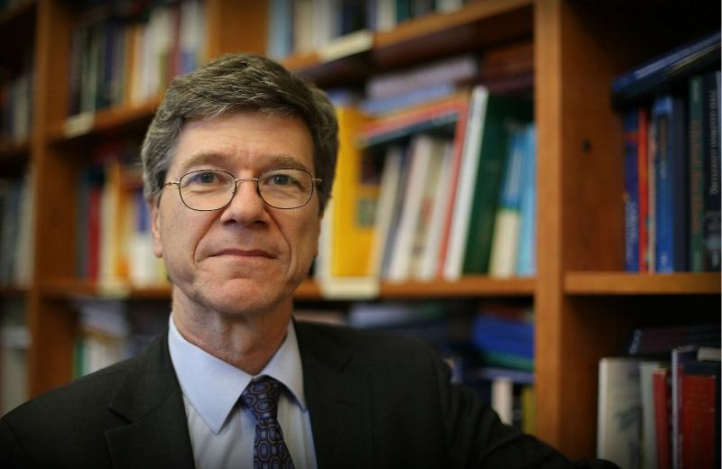 A person wearing glasses and a suit

Description automatically generated with low confidence