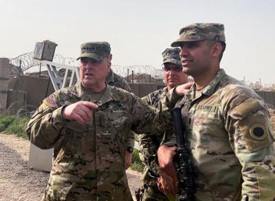 U.S. Joint Chiefs Chair Army General Mark Milley speaks with U.S. forces in Syria at a U.S. military base in Northeast Syria