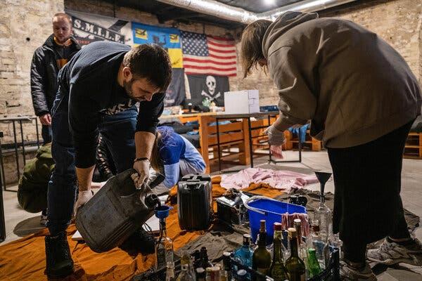 Ukrainians in Kyiv last week making incendiary bombs to be used against Russian forces.