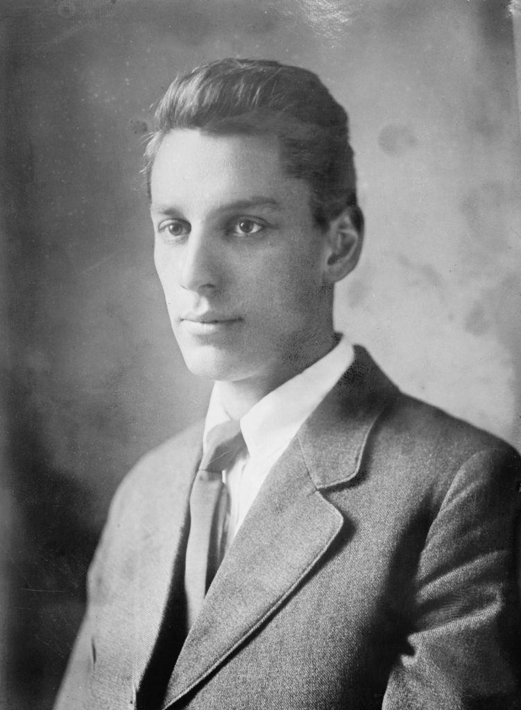 A person in a suit

Description automatically generated with medium confidence