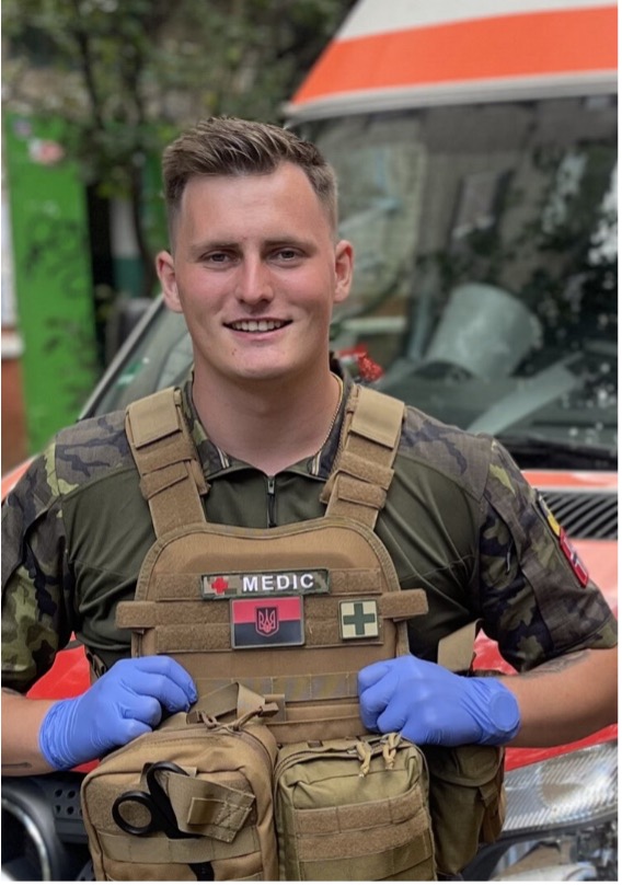 A person in a uniform
Description automatically generated with low confidence