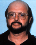 A person with a beard and glasses

Description automatically generated with medium confidence