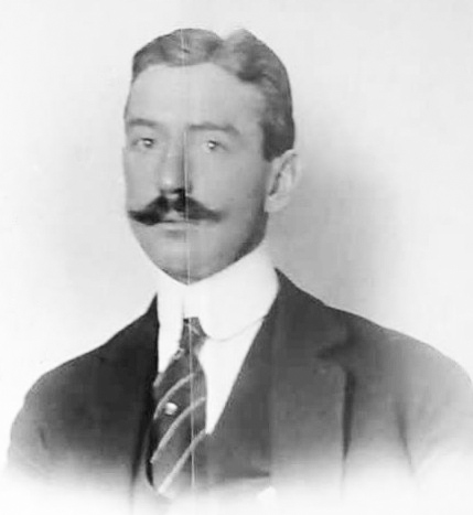 A person with a mustache

Description automatically generated