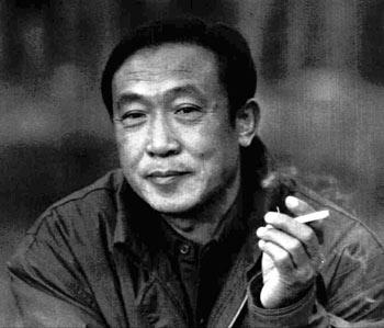 A person holding a cigarette

Description automatically generated with medium confidence