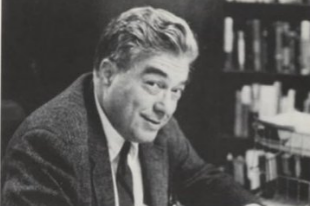 A person in a suit and tie

Description automatically generated with low confidence