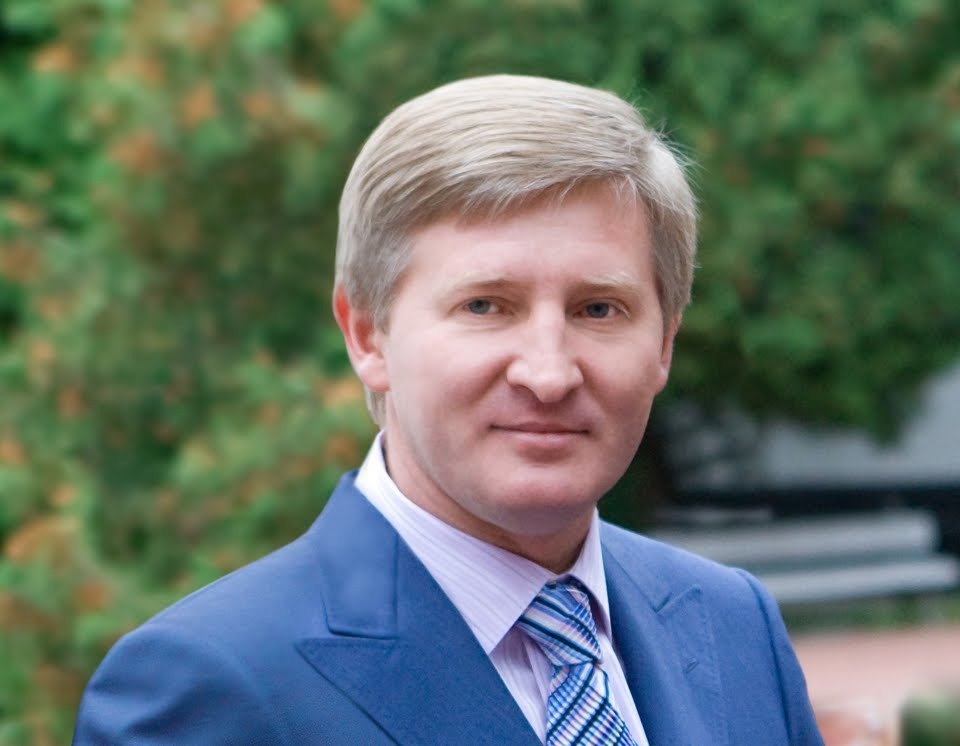 A person in a suit and tie

Description automatically generated with medium confidence