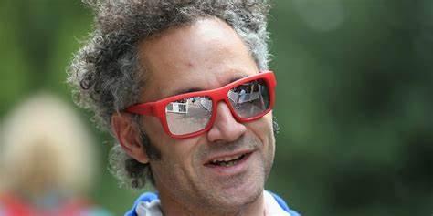 A person wearing red sunglasses
Description automatically generated with medium confidence