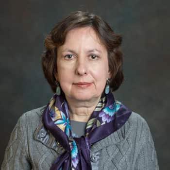 A person with a scarf around the neck

Description automatically generated with low confidence