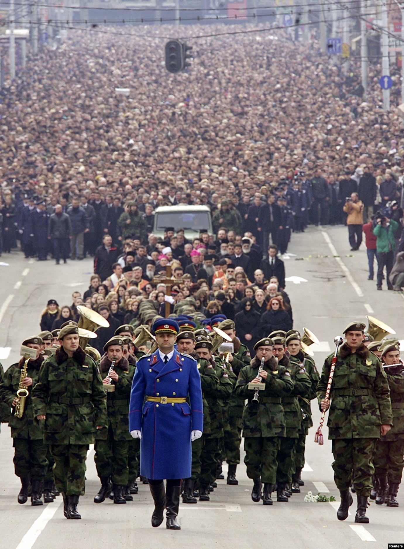Hundreds of thousands of people walk in a silent procession toward Belgrade's New Cemetery, where Djindjic was to be buried.