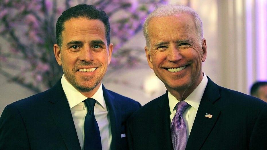 A couple of men in suits

Description automatically generated with low confidence