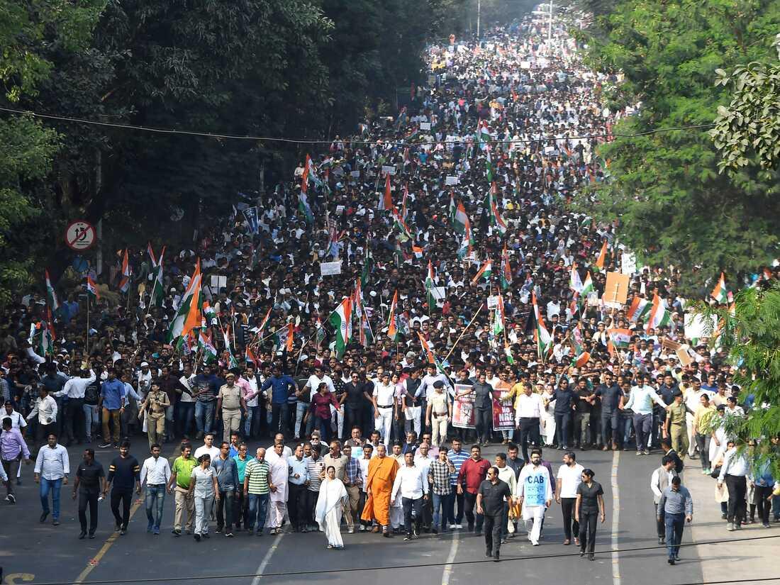 A large group of people on a road
Description automatically generated with low confidence
