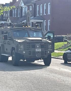 A military vehicle on the street
Description automatically generated with medium confidence