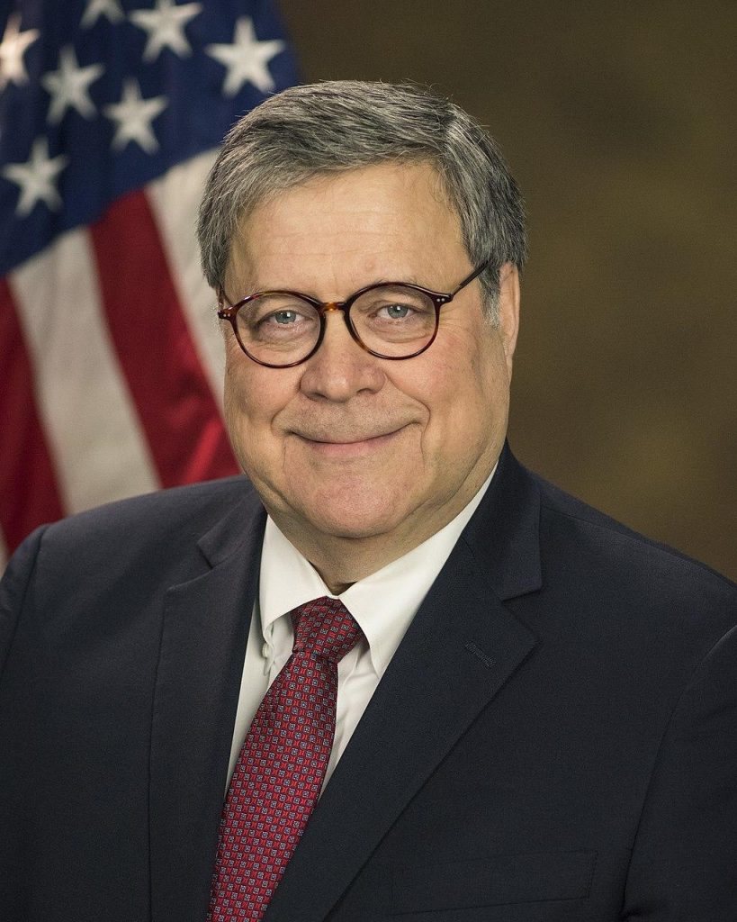A person in a suit and tie
Description automatically generated with low confidence