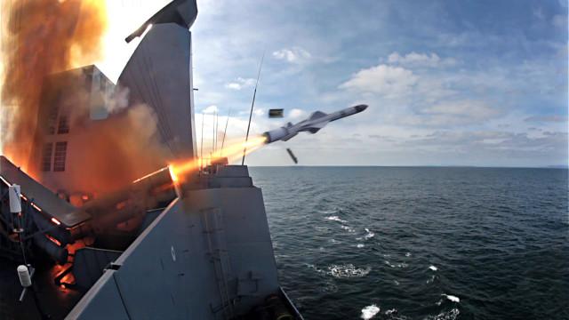 A picture containing sky, outdoor, weapon, missile

Description automatically generated