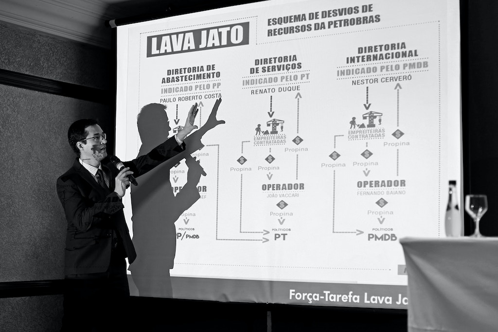 Brazil's Federal Public Ministry prosecutor, Deltan Martinazzo Dallagnol, speaks during a press conference about the Lava Jato operation on the Petrobras corruption scandal, in Curitiba on March 16, 2015. Brazilian police launched a new round of arrests Monday in the corruption scandal at state oil giant Petrobras, stating they had warrants for the arrest of 18 people in connection with the 10-year scheme of kickbacks and political payoffs that allegedly siphoned off $3.8 billion from the company.   AFP PHOTO/HEULER ANDREY        (Photo credit should read Heuler Andrey/AFP via Getty Images)