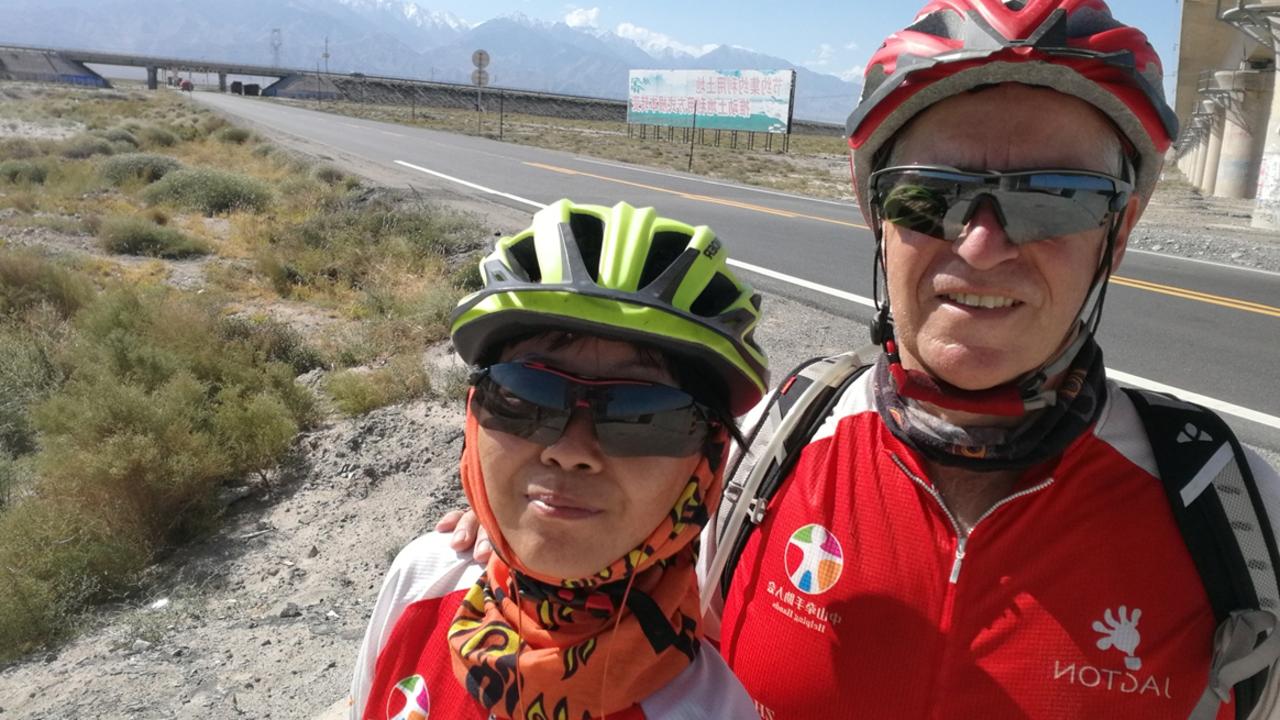 Jerry Grey and his wife Ann Liang Yuhua on a charity bike ride last year.