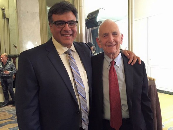 Two men in suits and ties

Description automatically generated with low confidence