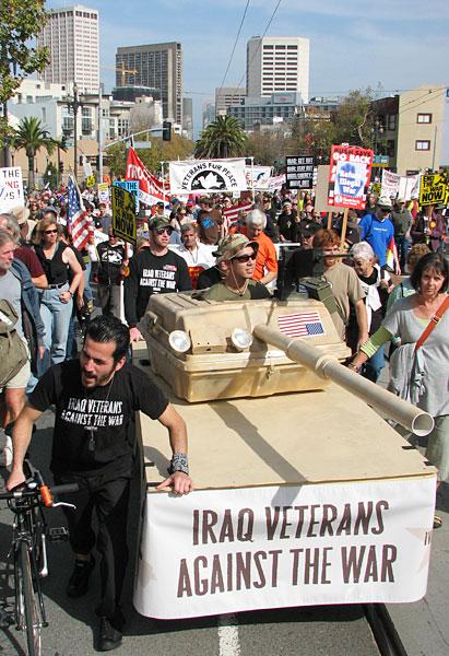 A group of people marching in a parade

Description automatically generated with medium confidence