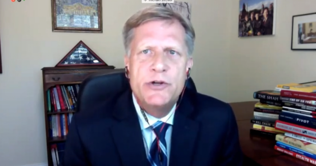 A person in a suit and tie

Description automatically generated with medium confidence