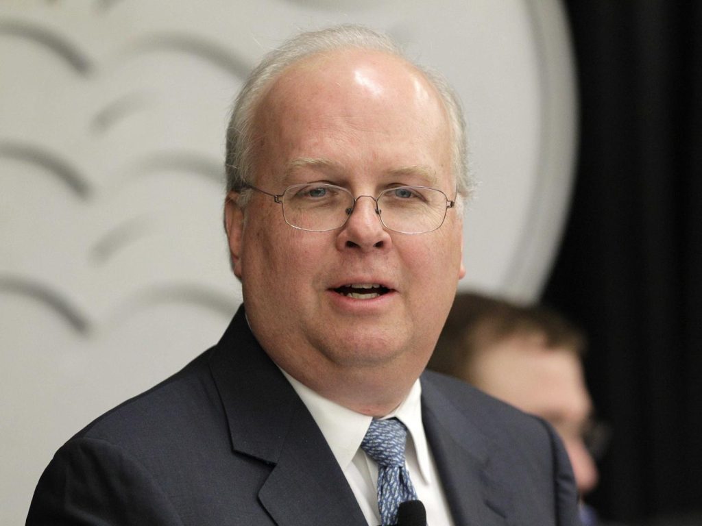 A person in a suit and tie

Description automatically generated with low confidence