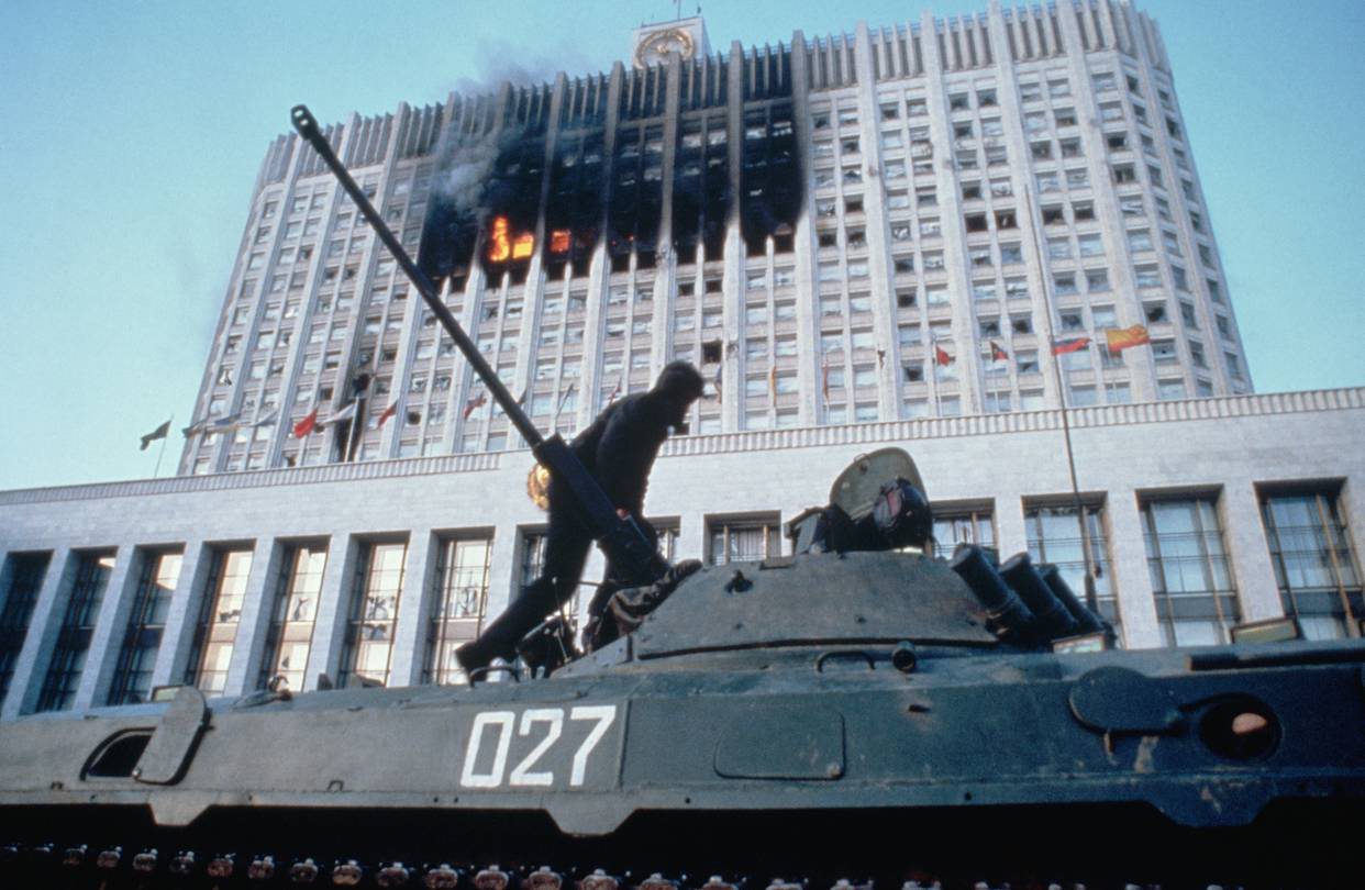 A person on top of a tank
Description automatically generated with medium confidence