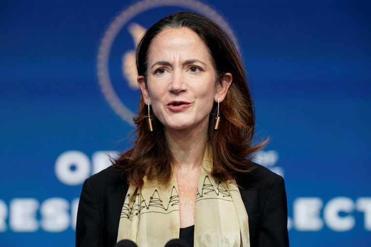 A person speaking into microphones

Description automatically generated with medium confidence