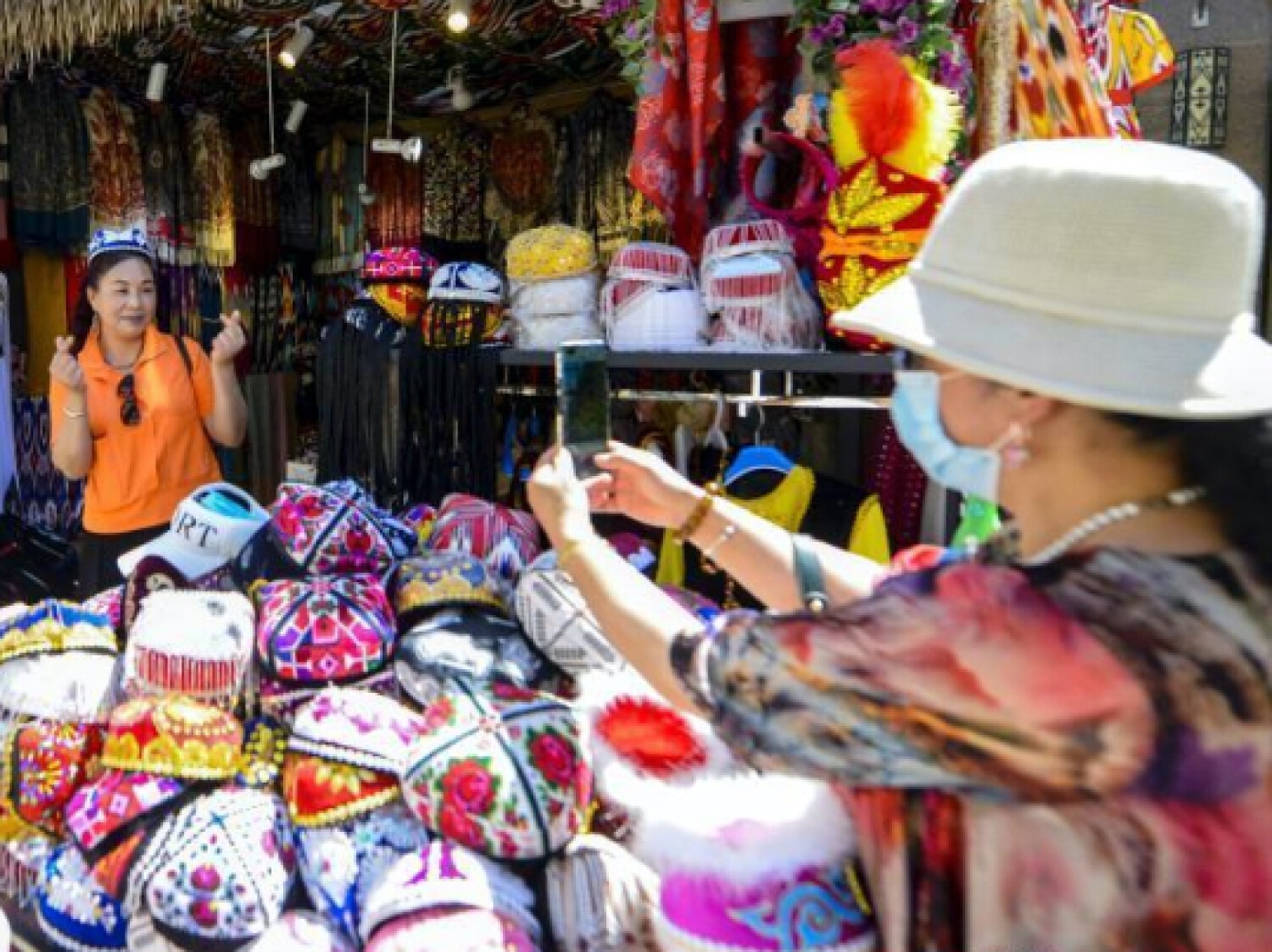 A picture containing scene, fashion accessory, person, clothing

Description automatically generated