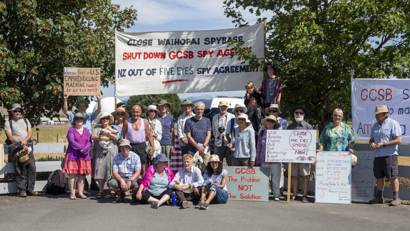 A group of people holding signs

Description automatically generated with medium confidence