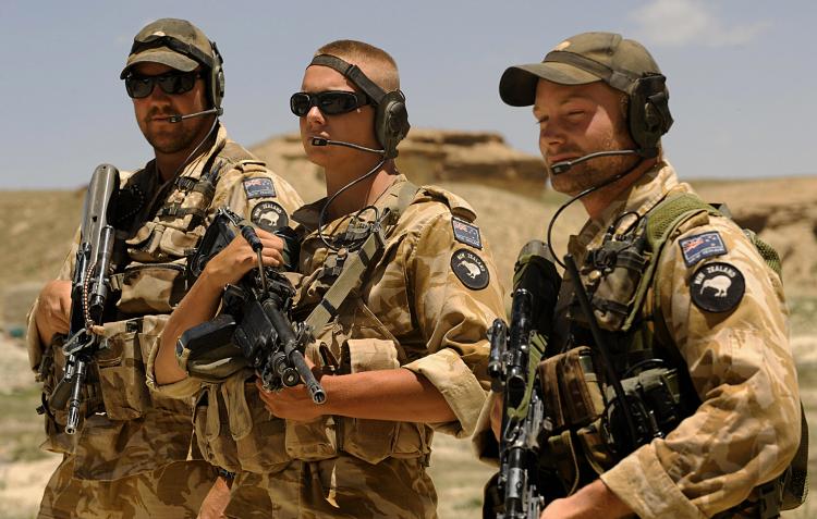 A group of soldiers holding guns

Description automatically generated with low confidence