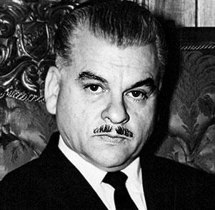 A person with a mustache

Description automatically generated