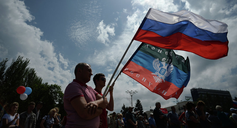 Participants at the rally in support of the Donetsk People's Republic on Lenin Square in Donetsk