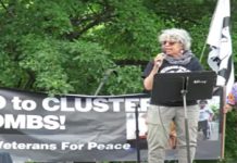 Citizens Rally Outside Artillery Factory in President Biden’s Hometown that Produces Parts of Cluster Bombs Destined To Kill Eastern Ukrainians and Russians