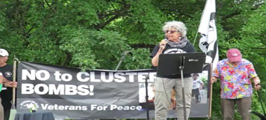 Citizens Rally Outside Artillery Factory in President Biden’s Hometown that Produces Parts of Cluster Bombs Destined To Kill Eastern Ukrainians and Russians