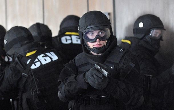 A group of people in black uniform

Description automatically generated
