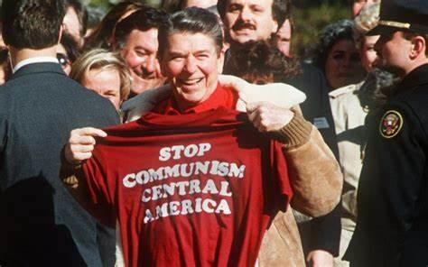 A person in a red shirt

Description automatically generated with medium confidence