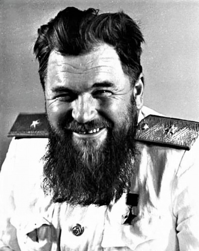 A person with a beard

Description automatically generated