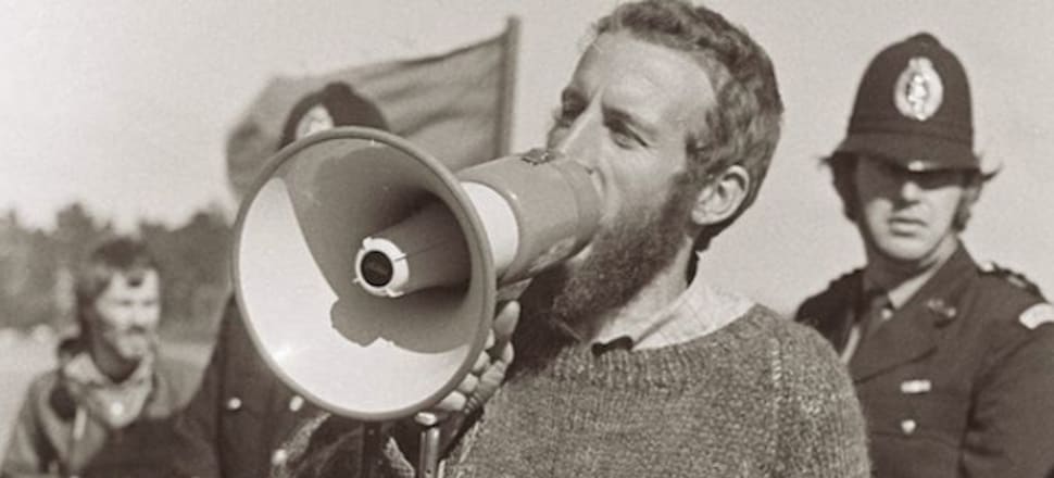A person with a megaphone Description automatically generated with medium confidence