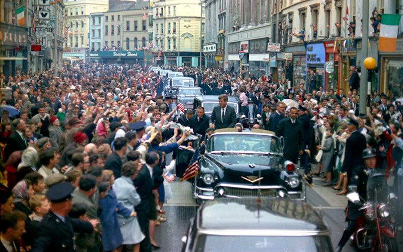A picture containing outdoor, vehicle, land vehicle, crowd

Description automatically generated