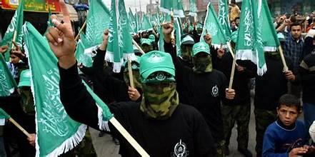 A group of people marching with flags
Description automatically generated