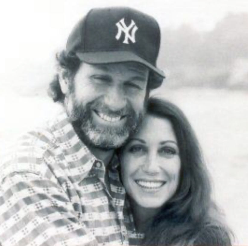 A person and person smiling for a picture

Description automatically generated