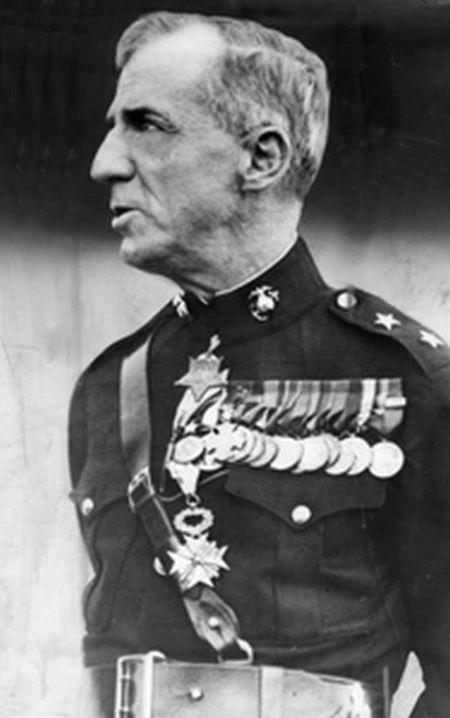 A person in military uniform with medals
Description automatically generated