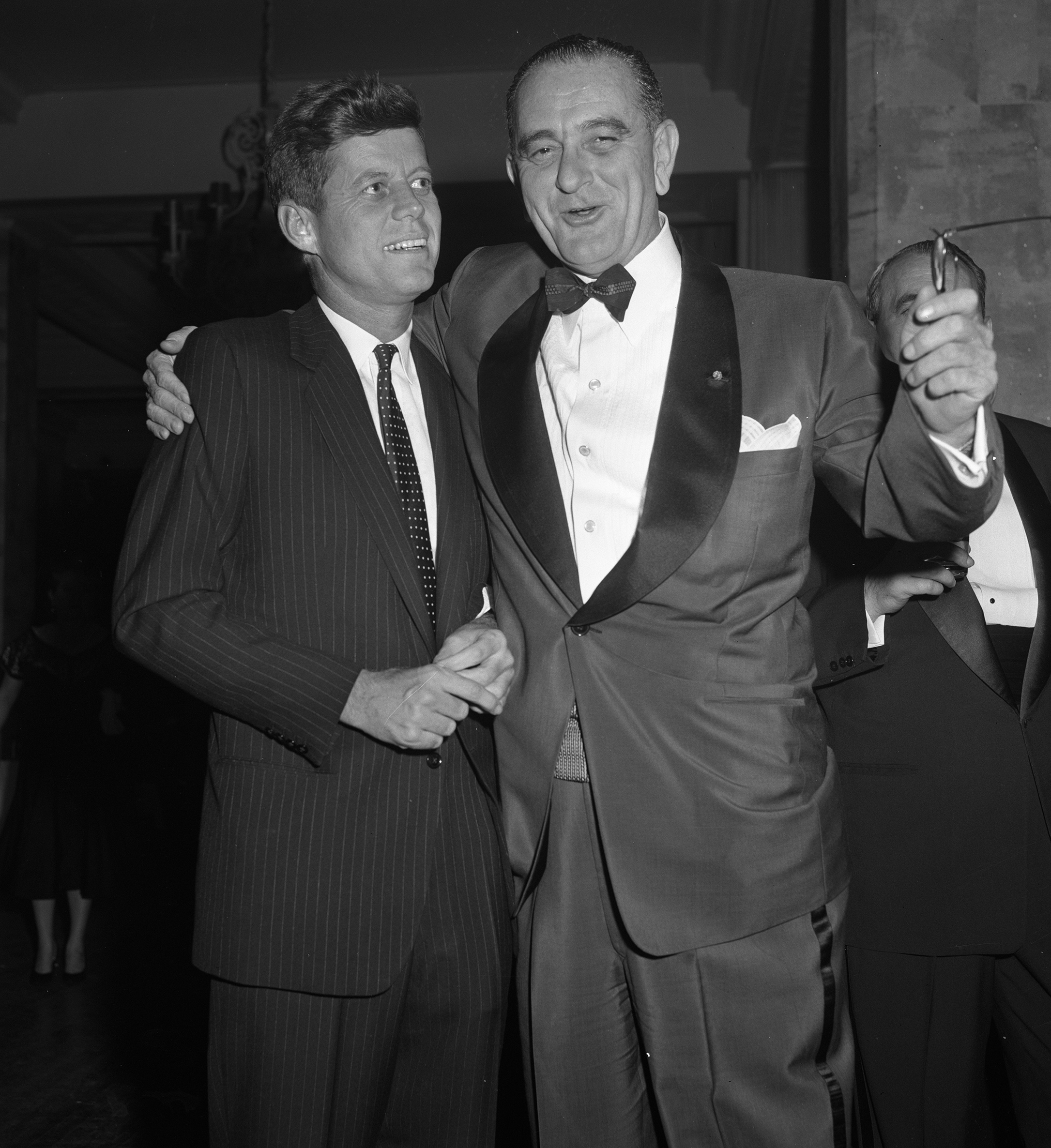 A group of men in suits

Description automatically generated