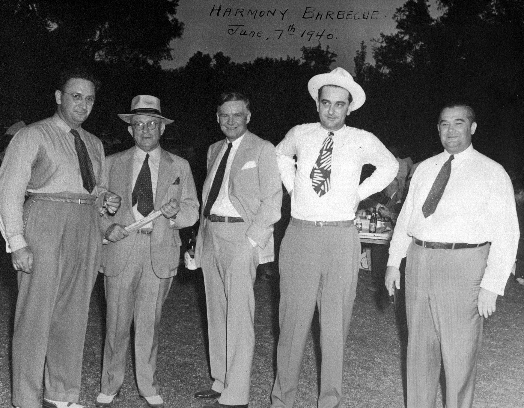 A group of men in suits

Description automatically generated