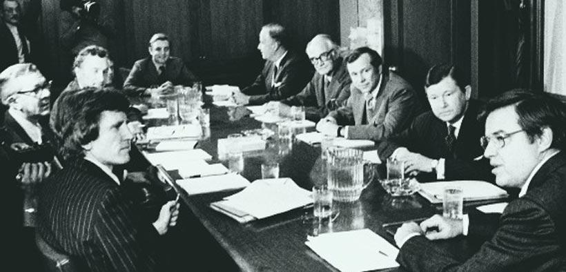 A group of people sitting at a table

Description automatically generated with low confidence