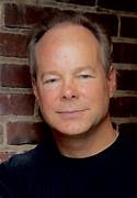 A person in a black shirt
Description automatically generated